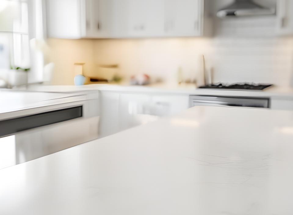 Bright kitchen after a deep clean with polished counters, cleared backsplash, and a clean floor